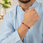 Marvel Silver red braided rakhi for brother with silver-tone bead centre design