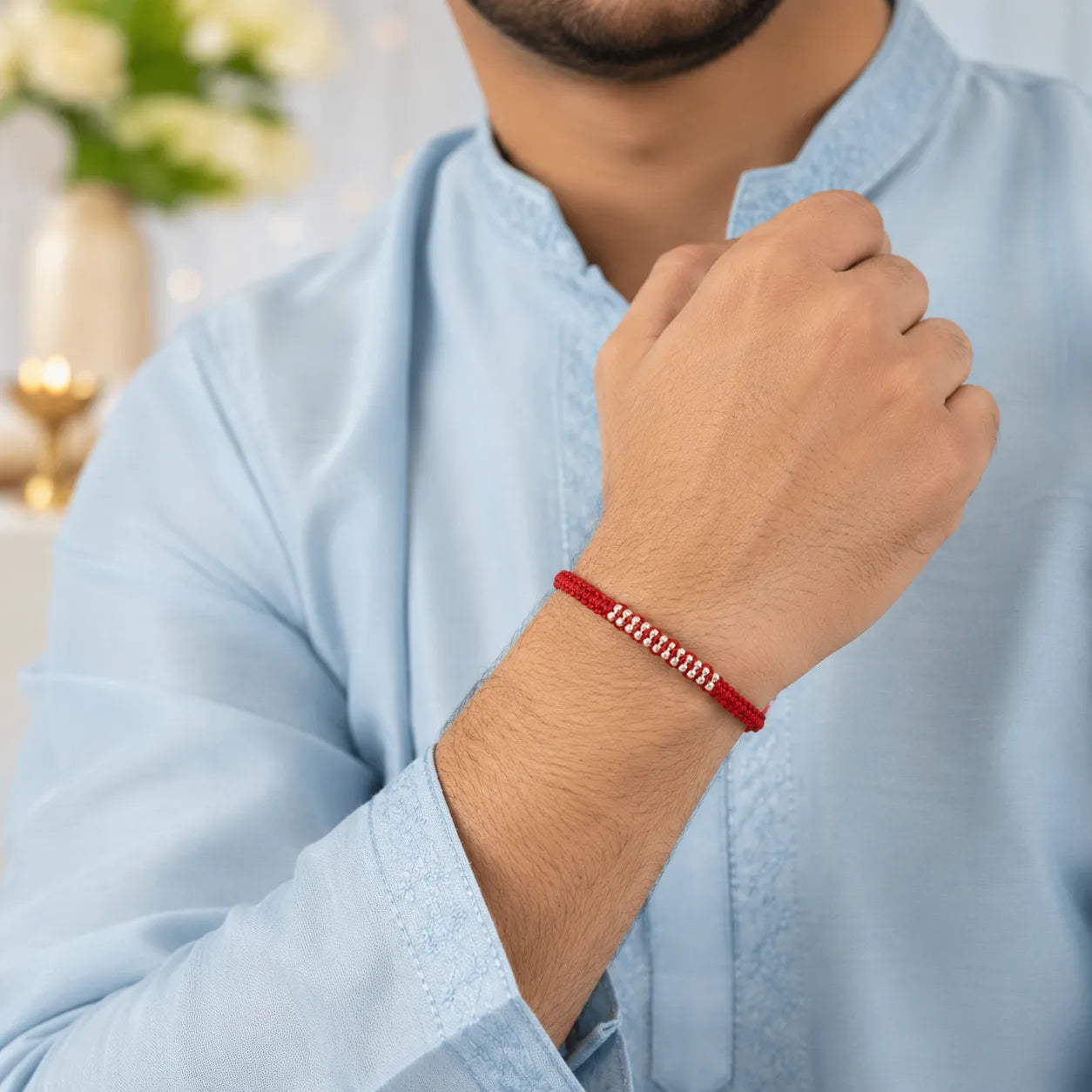 Marvel Silver red braided rakhi for brother with silver-tone bead centre design