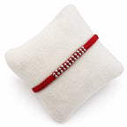 Marvel Silver red thread double bead rakhi for brother with polished silver-tone bead detailing