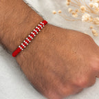 Marvel Silver red thread multi bead rakhi for brother with polished silver-tone bead cluster detailing