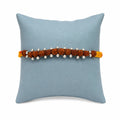 Marvel Silver Rudraksha bead rakhi for brother with yellow red braided thread and silver-tone beads