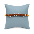 Marvel Silver Rudraksha bead rakhi for brother with yellow red braided thread and silver-tone beads