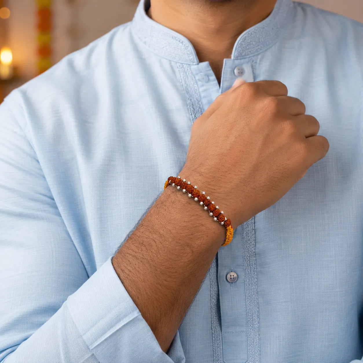 Marvel Silver Rudraksha bead rakhi for brother with yellow red braided thread and silver-tone beads