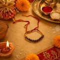 Marvel Silver Rudraksha bead rakhi for brother with yellow red braided thread and silver-tone beads