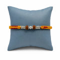 Marvel Silver Rudraksha bead rakhi bracelet for men with yellow red braided thread and silver-tone spacers