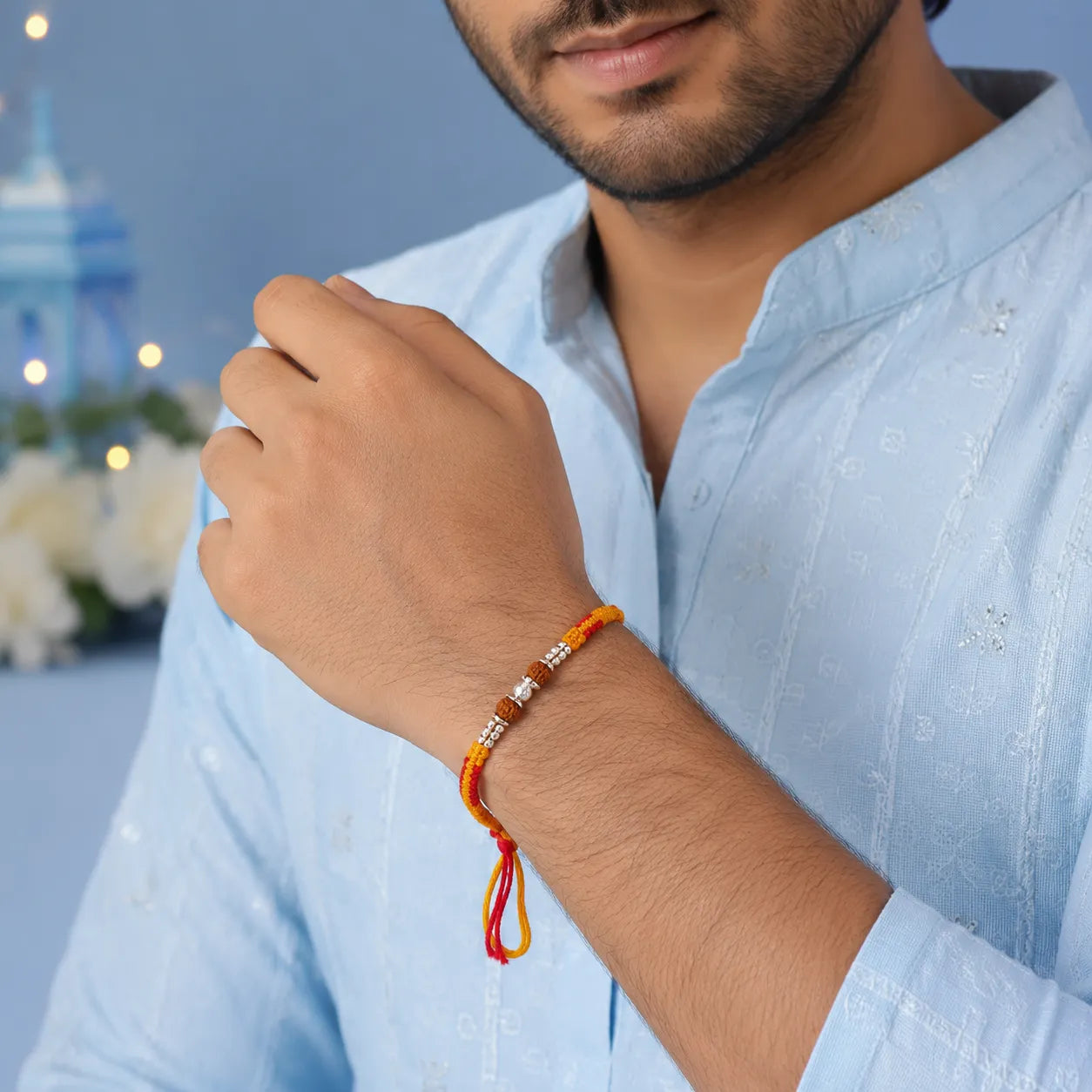 Marvel Silver Rudraksha bead rakhi bracelet for men with yellow red braided thread and silver-tone spacers