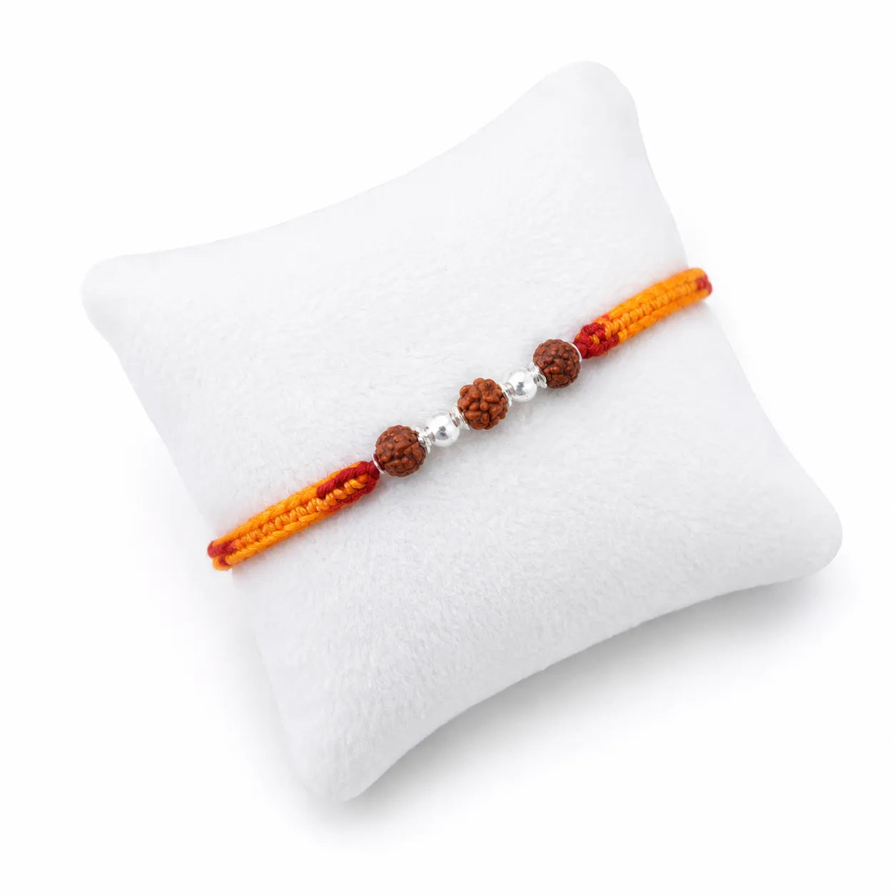 Marvel Silver Rudraksha bead rakhi with polished silver beads on a saffron and red braided thread