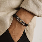 Marvel Silver Shani Dev adjustable bracelet for boys with detailed Shani Dev motif, silver geometric centerpiece and black segmented band