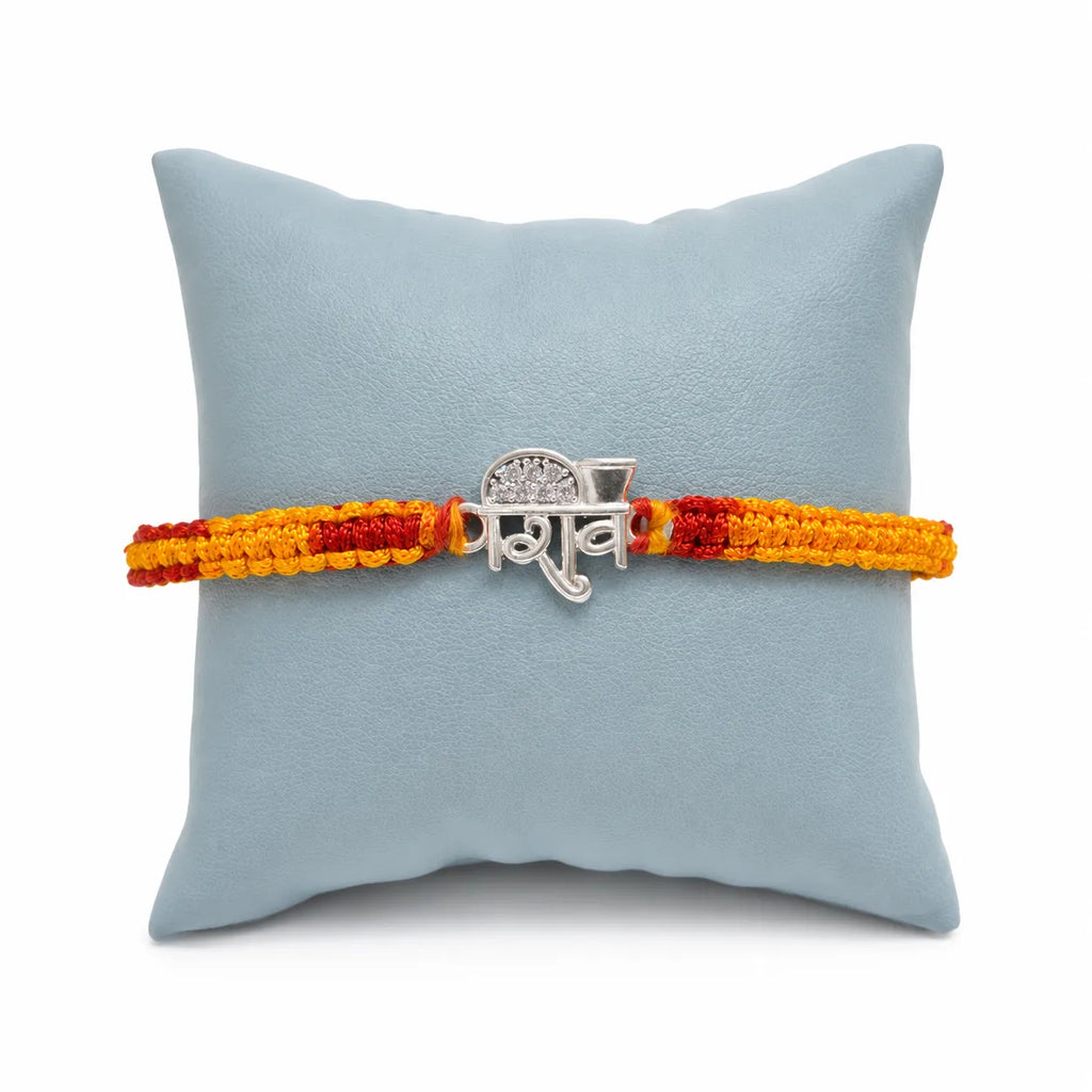 Marvel Silver Shiv name rakhi for brother with yellow red braided thread and silver-tone devotional centre motif