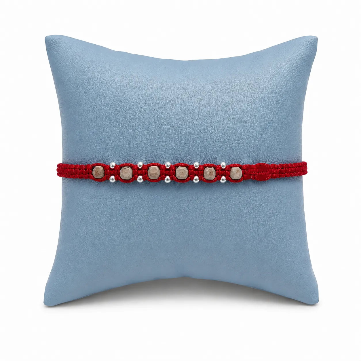 Marvel Silver square bead rakhi for brother with red braided thread, beige square beads and silver-tone accents