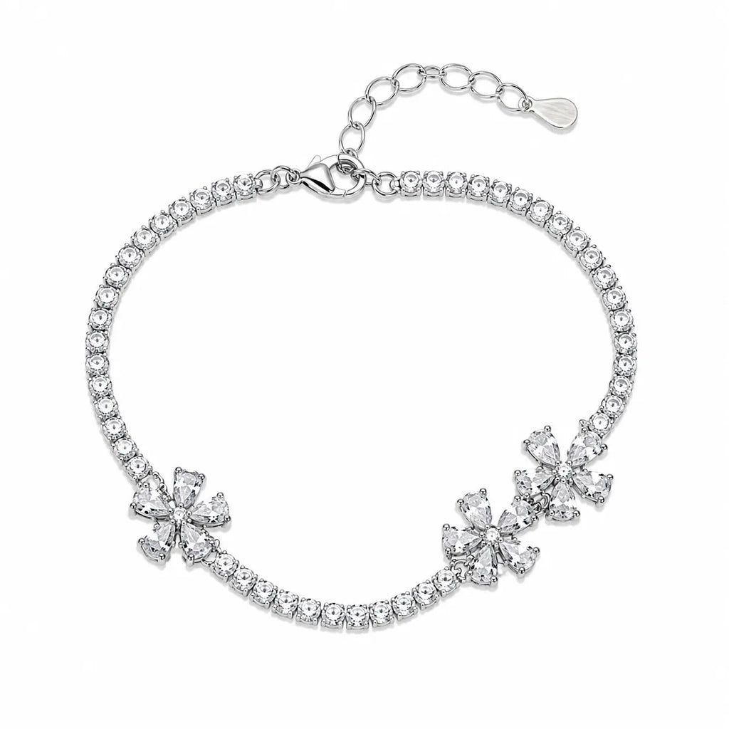 Marvel Silver 925 sterling silver tennis bracelet featuring three sparkling flower motifs with AAA Cubic Zirconia stones, adjustable chain, rhodium-plated finish, elegant bracelet for women and girls suitable for daily wear, parties, weddings, festive occasions, and gifting.