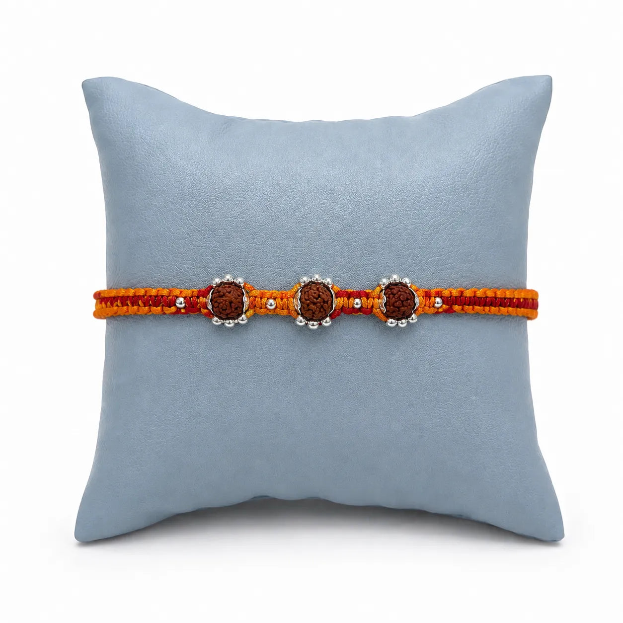 Marvel Silver triple Rudraksha rakhi for brother with red yellow braided thread and silver-tone bead accents