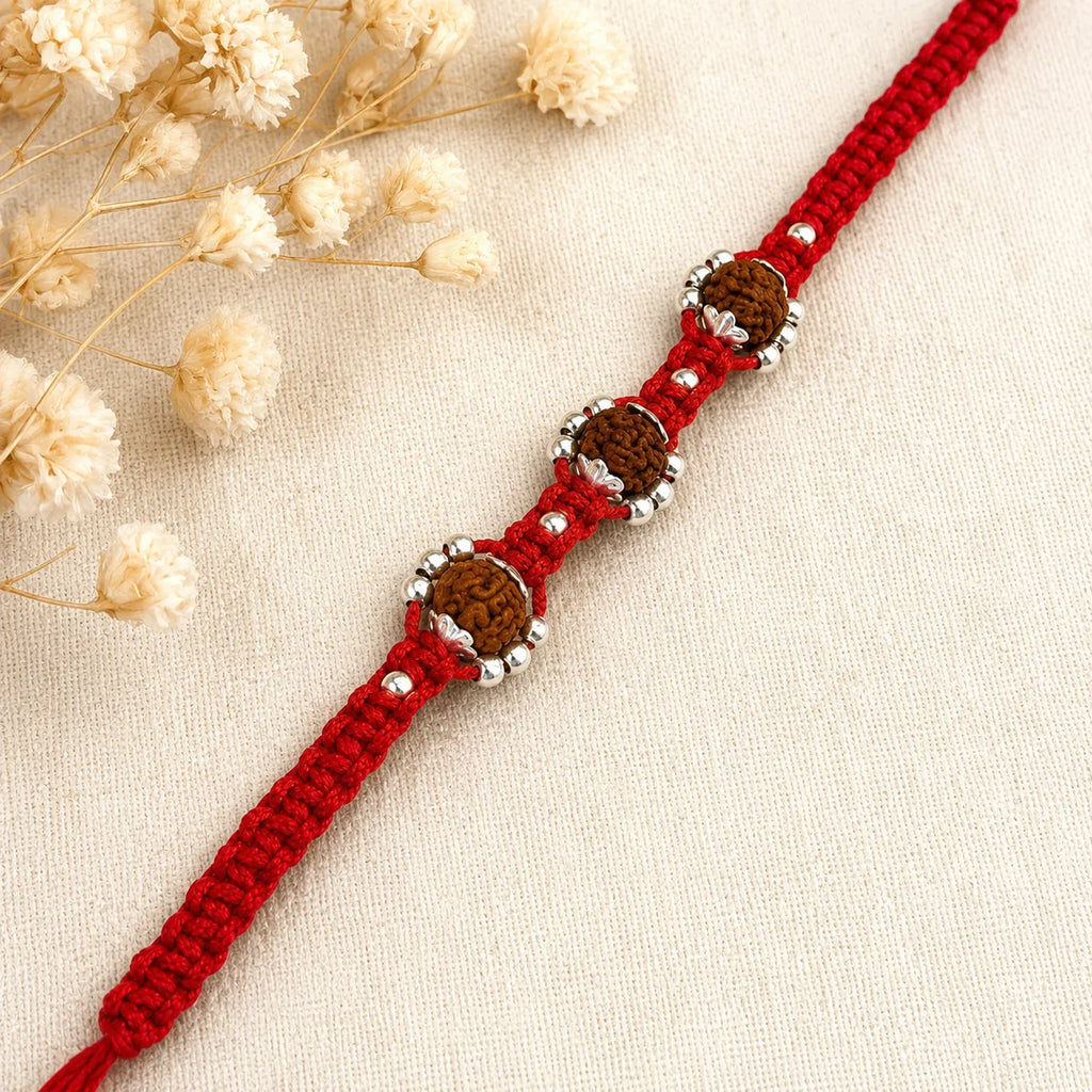 Marvel Silver triple Rudraksha red thread rakhi for brother with silver-tone bead accents