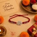 Marvel Silver 925 Silver Trishul Designer Rakhi with handcrafted red thread, silver beads, and sparkling zircon stones for Raksha Bandhan.