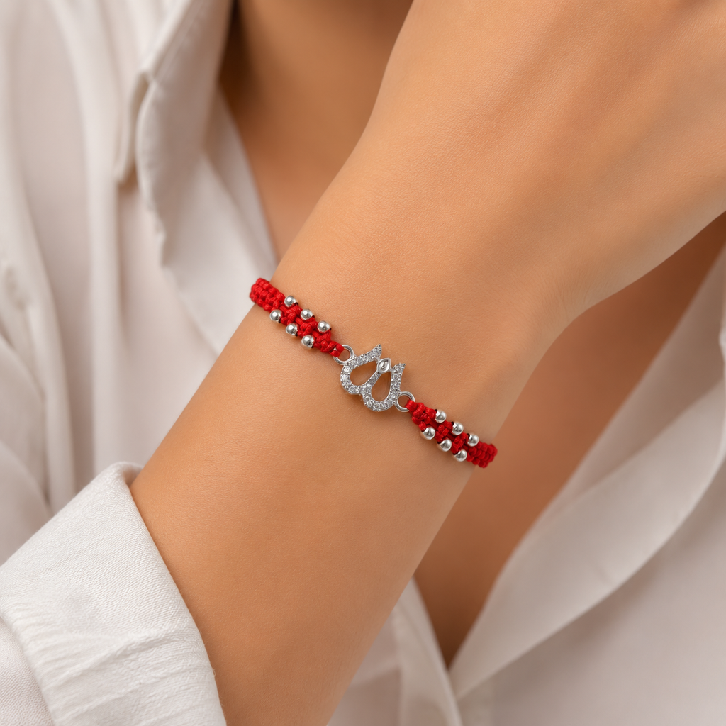 Marvel Silver 925 Silver Trishul Designer Rakhi with handcrafted red thread, silver beads, and sparkling zircon stones for Raksha Bandhan.