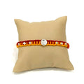 Marvel Silver Veera Rakhi with silver-finish Veera centerpiece, sparkling stone accents, and handcrafted red-yellow thread for Raksha Bandhan.