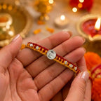 Marvel Silver Veera Rakhi with silver-finish Veera centerpiece, sparkling stone accents, and handcrafted red-yellow thread for Raksha Bandhan.