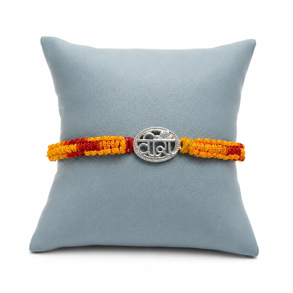 Marvel Silver Veera rakhi for brother with yellow red braided thread and silver-tone name centre motif