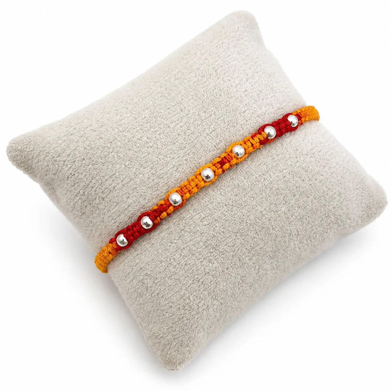 Marvel Silver yellow red bead rakhi for brother with polished silver-tone round bead detailing