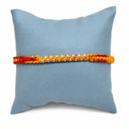 Marvel Silver yellow and red braided rakhi bracelet for men with silver-tone bead detailing