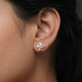 Marvel Silver Sparkling Crystal Floral Gold Plated Imitation Stud Earrings for Women with Baguette Cubic Zirconia Stones