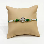 Marvel Silver Vishnu Tilak Silver Rakhi with Green Crystal Beads, White Pearl Beads and CZ Stone Vishnu Tilak Symbol for Raksha Bandhan