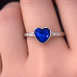 Dark blue heart with side stones