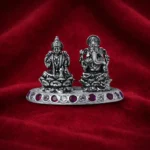 Lakshmi–Ganesha Silver Idol Set with Decorative Stone Base